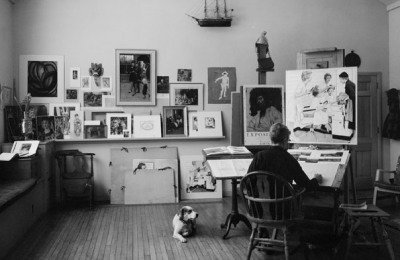 Rockwell in his studio; photo by Louis Lamone, n.d.
