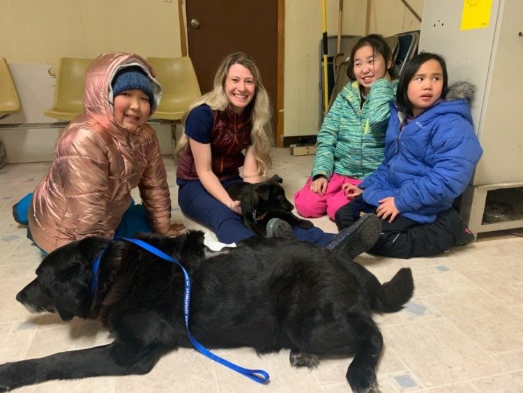 Veterinary student Amy Downey introduced schoolchildren in Nunapitchuk, Alaska, to the concept of doctors for dogs. (UAF/CSU photo)